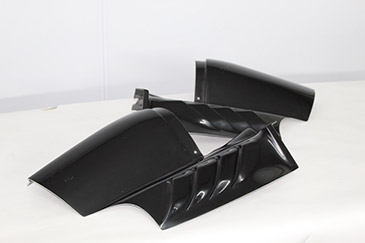 Vented engine cover side pieces